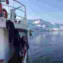 Arctic ski & sail on a classic yacht – Norwegian Adventure Company
