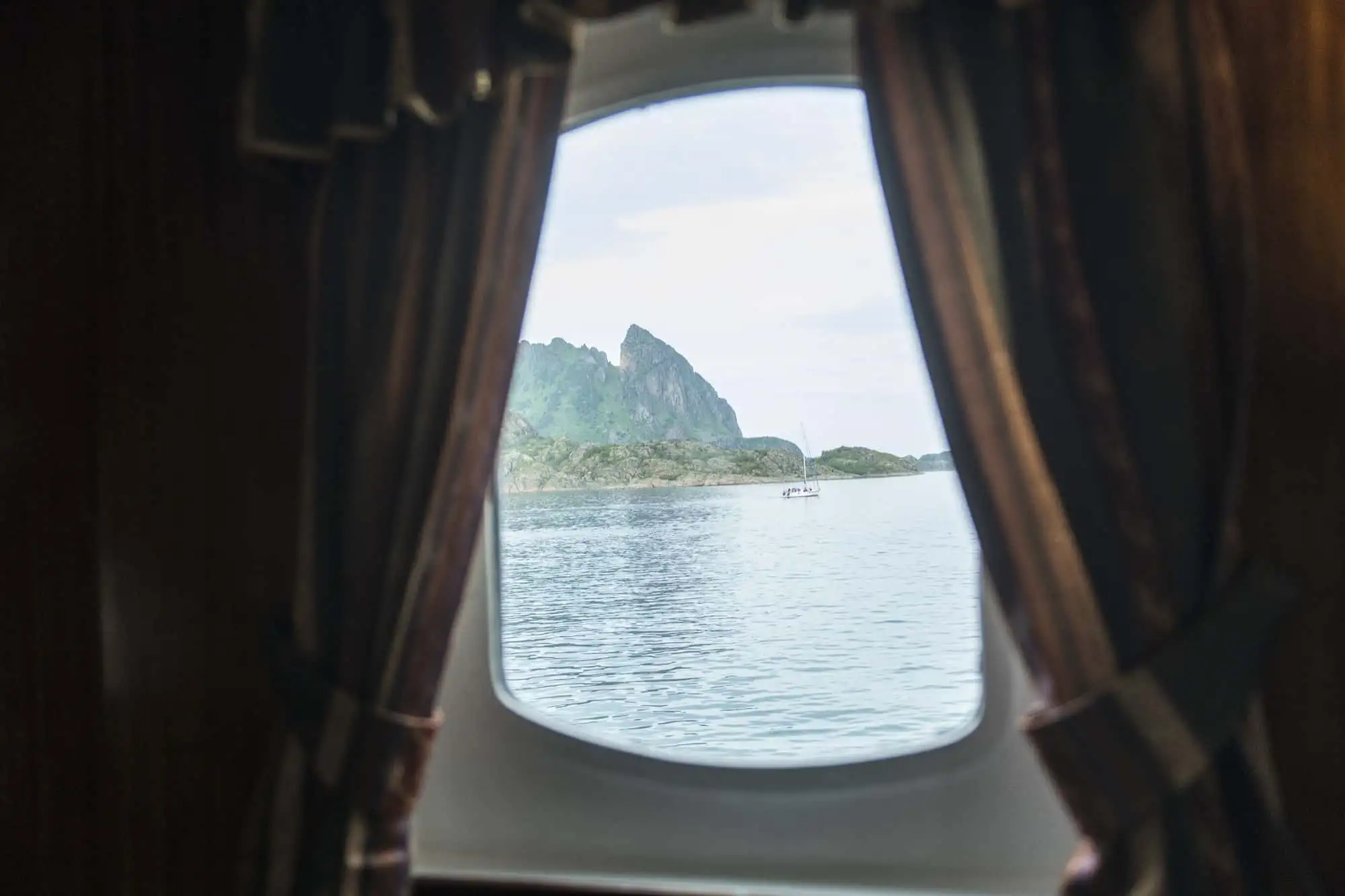 Go to bed during midnight sun and wake up to ocean view from the bed. – Norwegian Adventure Company