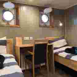 Double cabin with twin beds (lower deck) – Norwegian Adventure Company